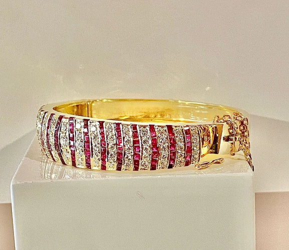 Bracelet Bracelet jonc ouvrant en or jaune 18 carats, rubis et diamants 58 Facettes AB608