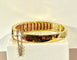 Bracelet Bracelet jonc ouvrant en or jaune 18 carats, rubis et diamants 58 Facettes AB608