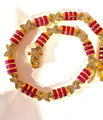Bracelet Bracelet en or jaune 18 carats avec rubis calibrés et diamants 58 Facettes AB620