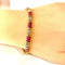 Bracelet Bracelet en or jaune 18 carats avec rubis calibrés et diamants 58 Facettes AB620
