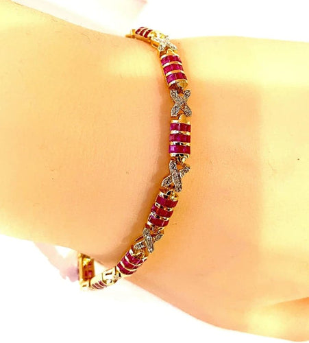 Bracelet Bracelet en or jaune 18 carats avec rubis calibrés et diamants 58 Facettes AB620