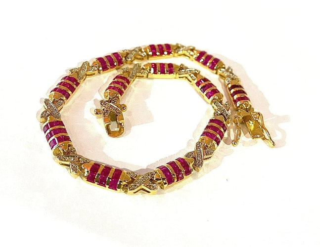 Bracelet Bracelet en or jaune 18 carats avec rubis calibrés et diamants 58 Facettes AB620