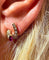 Boucles d'oreilles Boucles d’oreilles en or jaune 18 carats, diamants et pierres rouges 58 Facettes AB629