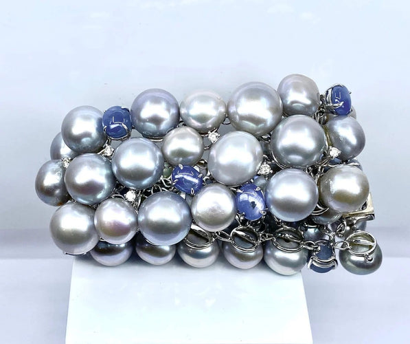 Bracelet Bracelet en or blanc 18 carats, saphirs étoilés, diamants et perles grises 58 Facettes AB632