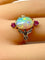 Bague 53 Bague en or jaune 18 carats à l’opale, diamants et rubis (vers 1900) 58 Facettes AB639