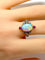 Bague 53 Bague en or jaune 18 carats à l’opale, diamants et rubis (vers 1900) 58 Facettes AB639