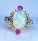 Bague 53 Bague en or jaune 18 carats à l’opale, diamants et rubis (vers 1900) 58 Facettes AB639