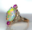 Bague 53 Bague en or jaune 18 carats à l’opale, diamants et rubis (vers 1900) 58 Facettes AB639
