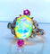 Bague 53 Bague en or jaune 18 carats à l’opale, diamants et rubis (vers 1900) 58 Facettes AB639