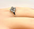 Bague 52 Bague Art déco en or blanc 18 carats et diamants, vers 1930 58 Facettes AB651