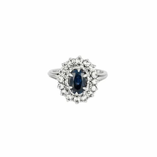 Bague 55 Bague marguerite en platine 850e avec saphir 1,30 ct et diamants 58 Facettes