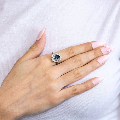 Bague 55 Bague marguerite en platine 850e avec saphir 1,30 ct et diamants 58 Facettes