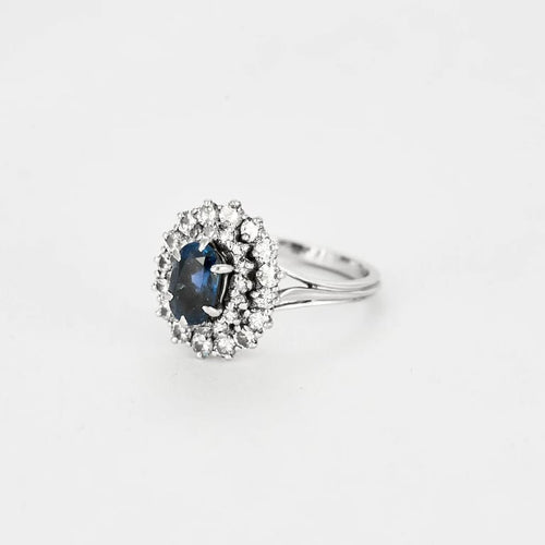 Bague 55 Bague marguerite en platine 850e avec saphir 1,30 ct et diamants 58 Facettes