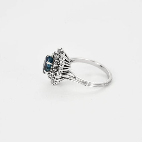 Bague 55 Bague marguerite en platine 850e avec saphir 1,30 ct et diamants 58 Facettes
