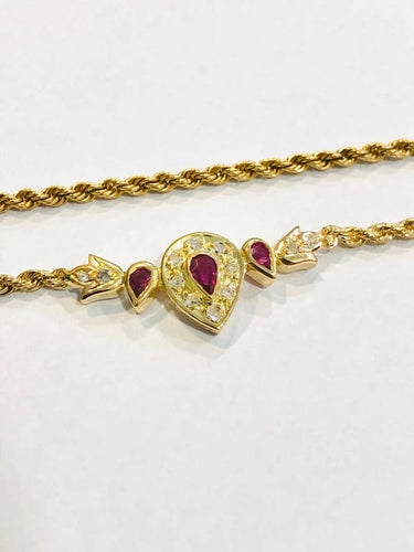 Collier Collier maille corde en or jaune 18 carats, rubis et diamants 58 Facettes