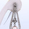 Boucles d'oreilles Boucles d’oreilles Art déco en or blanc 18 carats, perles Akoya et diamants 58 Facettes OR106