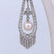 Boucles d'oreilles Boucles d’oreilles Art déco en or blanc 18 carats, perles Akoya et diamants 58 Facettes OR106
