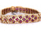 Bracelet Bracelet vintage en or jaune 18 carats avec rubis et diamants 58 Facettes BR99
