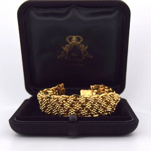 Bracelet Bracelet maille tressée en or jaune 18 carats 58 Facettes BR111