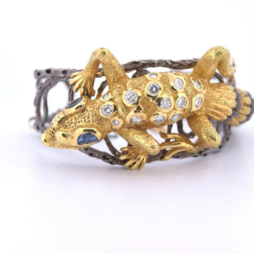 Bracelet Bracelet rigide motif gecko en or 18 carats, diamants et saphirs 58 Facettes BR113