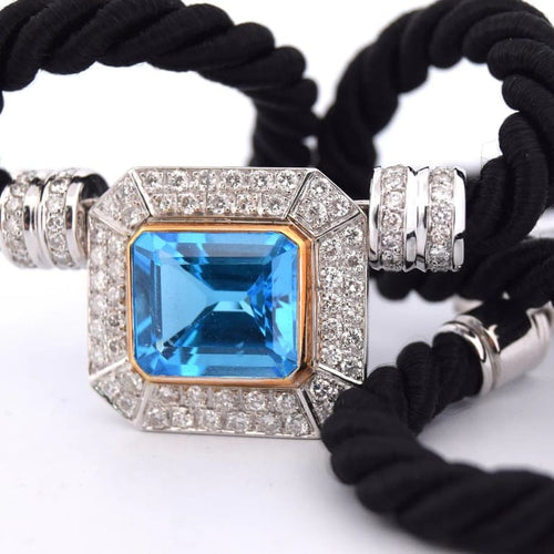 Pendentif Pendentif années 80 en or jaune 18 carats, topaze bleue et diamants 58 Facettes