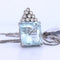 Pendentif Pendentif en or blanc 18 carats avec aigue-marine et diamants 58 Facettes CL43