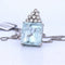 Pendentif Pendentif en or blanc 18 carats avec aigue-marine et diamants 58 Facettes CL43