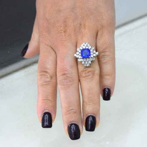 Bague 55 Bague en or blanc 18 carats avec tanzanite et diamants 58 Facettes AN272