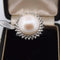 Bague 60 Bague en or 18 carats avec perle de culture et diamants 58 Facettes