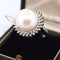 Bague 60 Bague en or 18 carats avec perle de culture et diamants 58 Facettes
