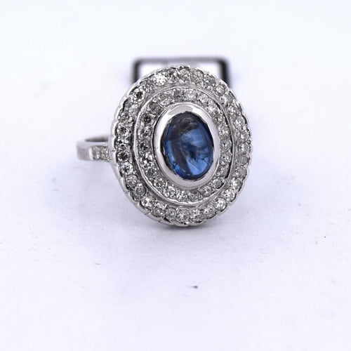 Bague 56 Bague en or blanc 18 carats avec saphir cabochon et diamants 58 Facettes