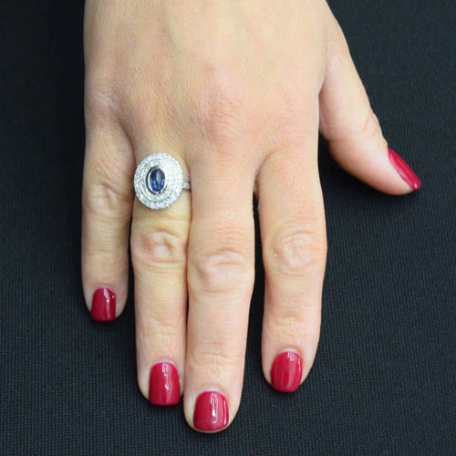 Bague 56 Bague en or blanc 18 carats avec saphir cabochon et diamants 58 Facettes