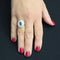 Bague 56 Bague en or blanc 18 carats avec saphir cabochon et diamants 58 Facettes