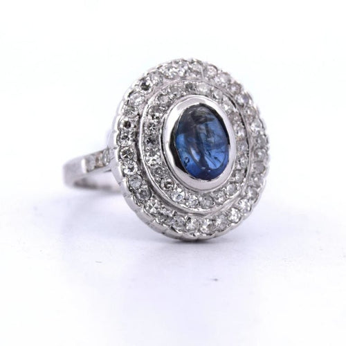 Bague 56 Bague en or blanc 18 carats avec saphir cabochon et diamants 58 Facettes