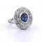Bague 56 Bague en or blanc 18 carats avec saphir cabochon et diamants 58 Facettes