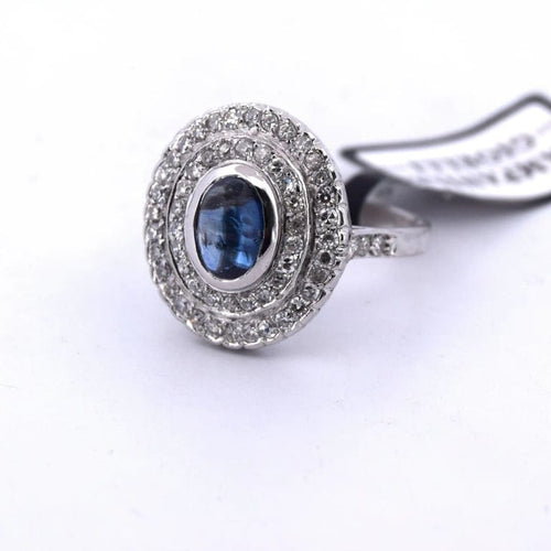 Bague 56 Bague en or blanc 18 carats avec saphir cabochon et diamants 58 Facettes