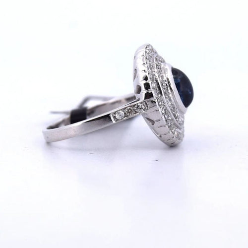 Bague 56 Bague en or blanc 18 carats avec saphir cabochon et diamants 58 Facettes