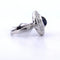 Bague 56 Bague en or blanc 18 carats avec saphir cabochon et diamants 58 Facettes