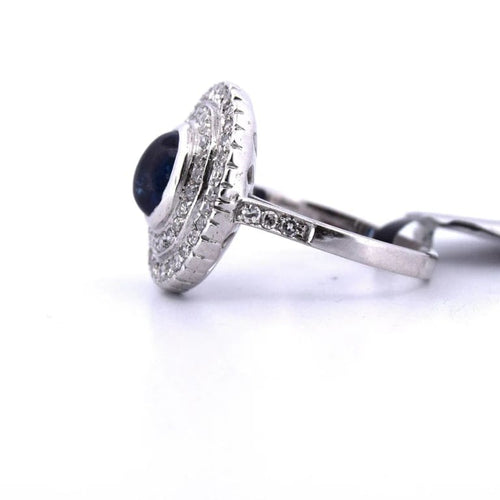 Bague 56 Bague en or blanc 18 carats avec saphir cabochon et diamants 58 Facettes