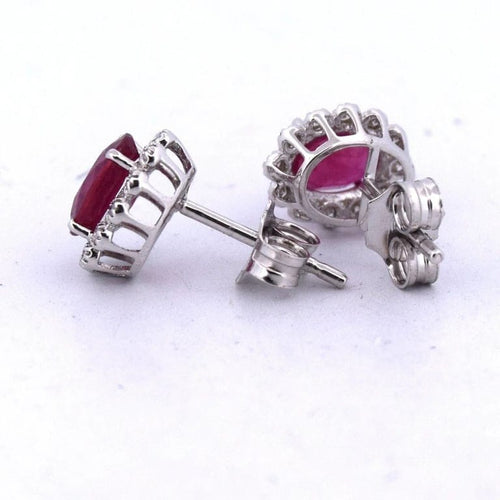 Boucles d'oreilles Boucles d'oreilles en or blanc 18 carats avec diamants et rubis 58 Facettes
