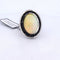 Bague 54 Bague vintage en platine ornée d’opale, d’onyx et de saphirs 58 Facettes