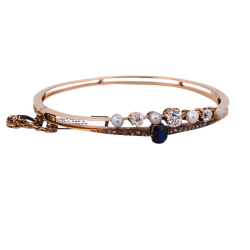 Bracelet Bracelet vintage en or jaune 18 carats avec perles, saphir et diamants 58 Facettes