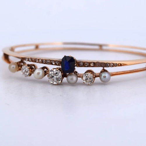 Bracelet Bracelet vintage en or jaune 18 carats avec perles, saphir et diamants 58 Facettes