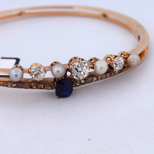 Bracelet Bracelet vintage en or jaune 18 carats avec perles, saphir et diamants 58 Facettes