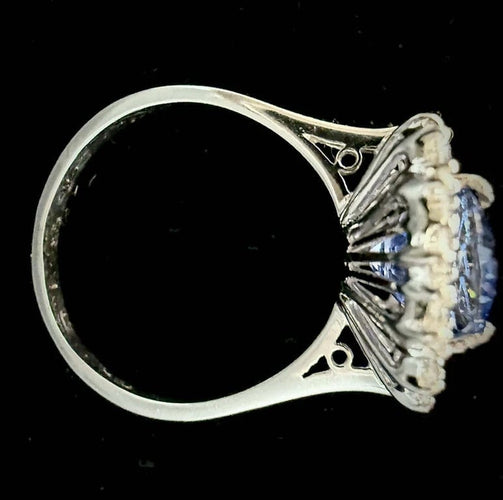 Bague 57 Bague marguerite en or blanc 18 carats avec saphir de Ceylan et diamants 58 Facettes