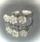 Bague 60 Bague trio de fleurs en or blanc 18 carats et diamants 58 Facettes