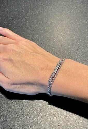 Bracelet Bracelet torsadé en or blanc 14 carats et diamants 58 Facettes