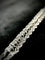Bracelet Bracelet torsadé en or blanc 14 carats et diamants 58 Facettes