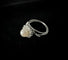 Bague 54.5 Bague en or blanc 18 carats avec perle blanche et diamants 58 Facettes