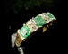 Bague 56.5 Bague en or jaune 18 carats avec émeraudes et diamants 58 Facettes